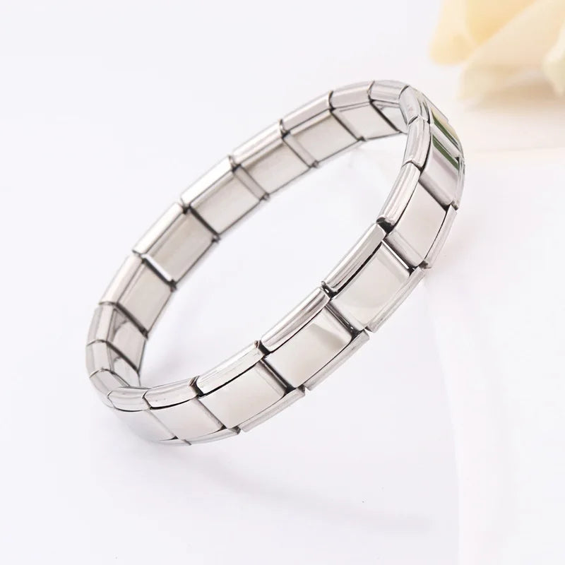 Stainless Steel Carving Bracelet  Material: Stainless steel  Size: 17.5 centimeters long  Color: Steel